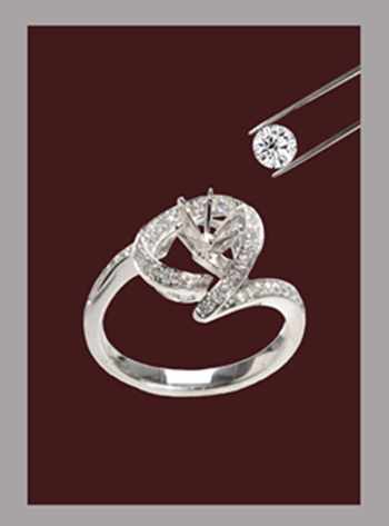 Diamond being held over a mounting